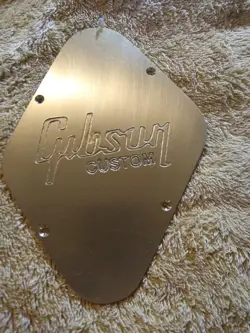 GIBSON/LES PAUL- BACK PLATE- BRASS- ENGRAVED W/BLEMISH