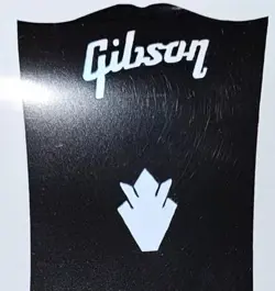 2 GIBSON HEADSTOCK LOGOS & 2 CROWN, DIE-CUT PEARL WHITE VINYL. DECAL