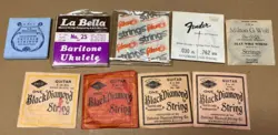 LOT 9 BLACK DIAMOND GIBSON FENDERGUITAR STRINGS LA BELLA LA MELODIE UKULELE