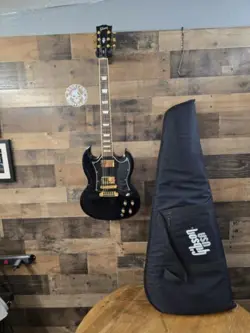 2005 GIBSON SG STANDARD EBONY WITH UPGRADES AND W/ GIGBAG