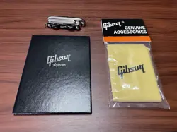 GIBSON ACOUSTIC ELECTRIC GUITAR AND BASS ITEMS MULTI TOOL POLISHING CLOTH COA
