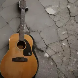 ACOUSTIC GUITAR BUSTED