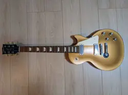 TRIBUTE GUITAR GOLD