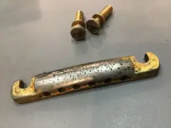 GIBSON 1969 VINTAGE ALUMINUM GOLD TAILPIECE FOR LES PAUL & SEMI-ACOUSTIC MODELS