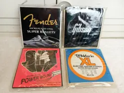LOT OF 4,FENDER STAINLESS BULLETS,GIBSON,POWER WOUND,D'ADDARIO GUITAR STRINGS