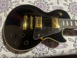 GIBSON LES PAUL CUSTOM GUITAR, GLOSSY BLACK. BRAND NEW CONDITION, NEVER USED.