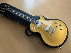 GIBSON LES PAUL DELUXE 2001 GOLD TOP ELECTRIC GUITAR W/HARD CASE USED PRODUCT