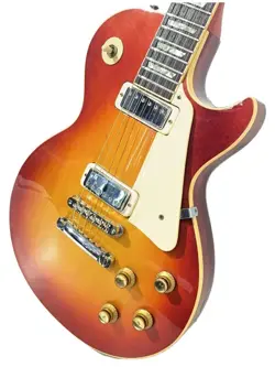 GIBSON 1976 LES PAUL DELUXE ELECTRIC GUITAR - SUNBURST, HARD CASE, USED