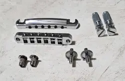 GIBSON USA TUNE-O-MATIC BRIDGE TAILPIECE, LES PAUL  ALUMINUM/CHROME