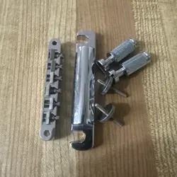 BRIDGE TAILPIECE AND