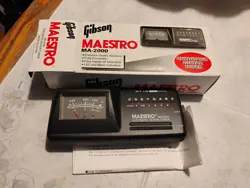 GUITAR TUNER WITH