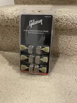 VINTAGE NICKEL MACHINE HEADS(WITH PEARLOID BUTTONS)