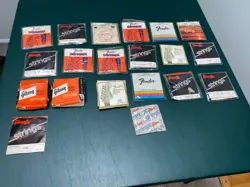 LOT OF NEW ELECTRIC GUITAR STRINGS. GIBSON, FENDER, FENDER DYNAMAX. ESTATE FIND!