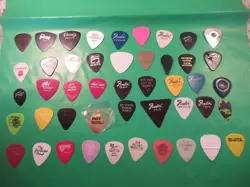 GUITAR PICK LOT OF 46 PICKS OLD & USED FENDER GIBSON KLUTZ PEAVY & OTHERS