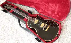 GIBSON LES PAUL STUDIO CUSTOM 1984 NORLIN ERA ELECTRIC GUITAR W/ CHAINSAW CASE