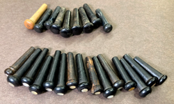 LOT: 24 VINTAGE EBONY UNSLOTTED GUITAR BRIDGE PINS MARTIN GIBSON MOP ABALONE