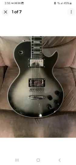 2001 LES PAUL CUSTOM W/EBONY FINGERBOARD -GLOSS - SILVERBURST- M.O.P INLAYS