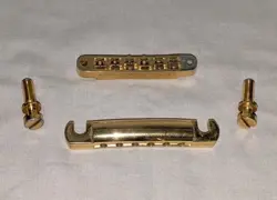 GIBSON VINTAGE 1980'S LES PAUL LP BRIDGE & TAILPIECE W/ STUDS, GOLD