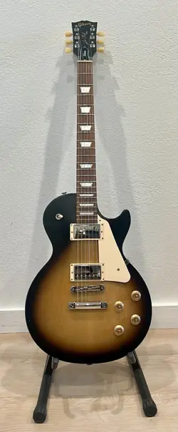 2022 GIBSON LES PAUL TRIBUTE W/ CASE - SATIN TOBACCO BURST (DAMAGED HEADSTOCK)