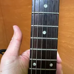 BROWN ELECTRIC GUITAR