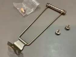 TRAPEZE TAILPIECE W/STUDS