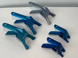 LOT OF 5 MILLIPORE ALUMINUM CLAMPS (3 XX1004703) (2 XX1002503)