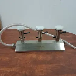 USED MILLIPORE MIAC03P01 3-POSITION VACUUM MANIFOLD GOOD CONDITION.