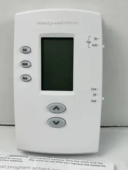 PROGRAMMABLE 1H/1C THERMOSTAT