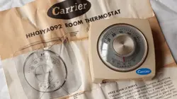 CARRIER THERMOSTAT HH01YA092 HONEYWELL  FOR HEATING COOLING.