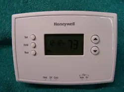 7-DAY PROGRAMABLE THERMOSTAT