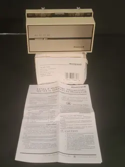 HONEYWELL T874D 1009 HEAT-COOL THERMOSTAT WITH SUBBASE