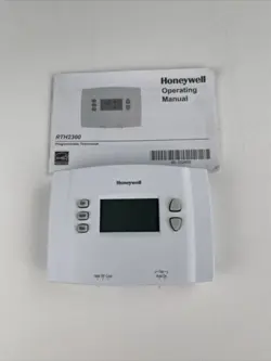 NEW UNUSED HONEYWELL RTH2300B1012 5-2 DAY PROGRAMABLE BACKLIT THERMOSTAT RTH2300