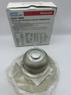 HONEYWELL T87F1859  ROUND HEATING & COOLING THERMOSTAT W/ BASE & WALL PLATE