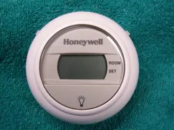 HONEYWELL T8775C1005 ROUND ELECTRONIC NON-PROGRAMABLE THERMOSTAT 
