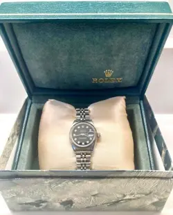 Ladies Rolex Oyster Datejust 26mm white gold bezel black face with diamond dial