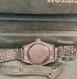 Ladies Rolex Oyster Datejust 26mm white gold bezel black face with diamond dial