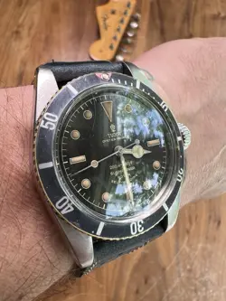 SUBMARINER RED TRIANGLE