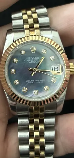 Rolex Silver Oyster Pink Mother of Pearl Datejust Watch