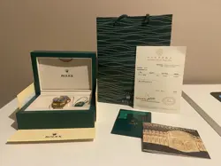 ROLEX SUBMARINER 116613LB  GOLD OYSTER BRACELET WITH BLUE BEZEL