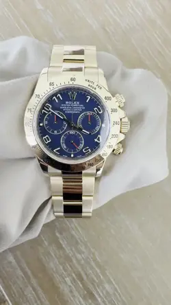 ROLEX COSMOGRAPH DAYTONA 18K YELLOW GOLD BLUE RACING ARABIC NUMERAL DIAL 116528