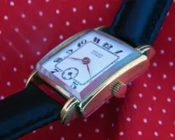 1950's ROLEX 27MM x 37MM RECTANGULAR GOLD PLATED FANCY CASE WHITE DIAL SERVICED