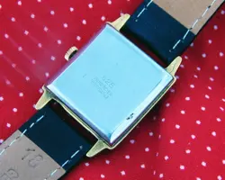 1950's ROLEX 27MM x 37MM RECTANGULAR GOLD PLATED FANCY CASE WHITE DIAL SERVICED