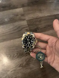 BLACK AND GOLD WATCH