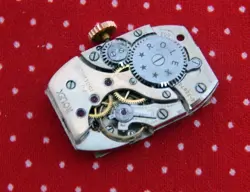 1950's ROLEX 21.4MMX37MM GOLD PLATED RECTANGULAR FANCY CASE WHITE DIAL SERVICED