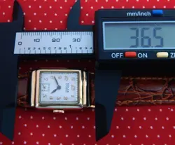 1950's ROLEX 21.4MMX37MM GOLD PLATED RECTANGULAR FANCY CASE WHITE DIAL SERVICED