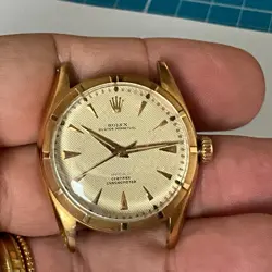 ? ROLEX OYSTER PERPETUAL 6085 CHRONOMETER HONNEYCOMB RED 18K ROSE BUBBLEBACK