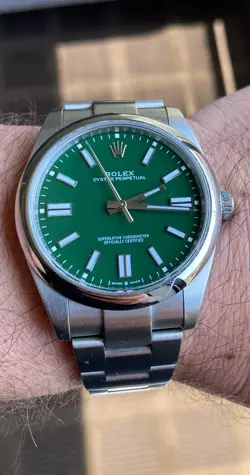 ROLEX OYSTER PERPETUAL 41MM GREEN DIAL 124300
