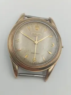 9CT GOLD ROLEX PERPETUAL PRECISION AUTOMATIC MOVEMENT HONEYCOMB PATINA DIAL