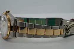Rolex 15223 Date 34 mm Steel & 18k Gold Tags Hologram Unpolished N.O.S. c. 2005