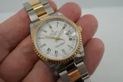 Rolex 15223 Date 34 mm Steel & 18k Gold Tags Hologram Unpolished N.O.S. c. 2005